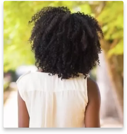 The back of a person wearing a white shirt